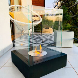 A stylish balcony with outdoor furniture and a Sunset Garden bioethanol fire