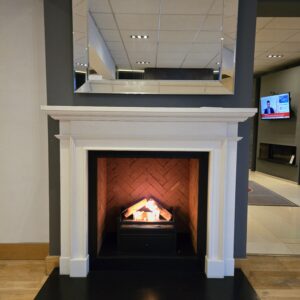 A stylish Elan basket open-fire bioethanol fire with a Harvard custom-made fireplace